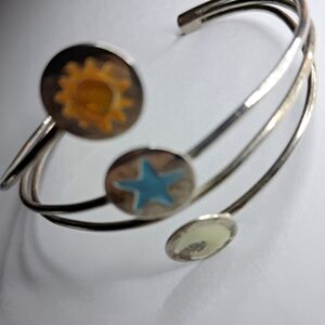 Silvertone Cuff Bracelet w/Sun, Moon & Stars